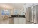 Bright kitchen with stainless steel refrigerator at 14404 Stirling Dr, Lakewood Ranch, FL 34202