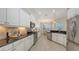 Bright kitchen with stainless appliances and white cabinetry at 14404 Stirling Dr, Lakewood Ranch, FL 34202