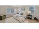 Relaxing main bedroom with dual windows and neutral decor at 14404 Stirling Dr, Lakewood Ranch, FL 34202