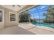 Screened pool area with a view of the lake at 14404 Stirling Dr, Lakewood Ranch, FL 34202