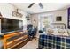 Cool bedroom with ceiling fan, a full bed, window, work desk, and dresser at 16620 Fairbolt Way, Odessa, FL 33556