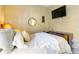 Comfortable bedroom with neutral tones, a cozy bed, and modern decor, providing a relaxing space at 16620 Fairbolt Way, Odessa, FL 33556