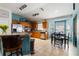 Bright eat-in kitchen featuring stainless appliances and tiled floor at 16620 Fairbolt Way, Odessa, FL 33556