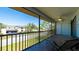 Spacious screened balcony, perfect for outdoor seating and enjoying views of the community and landscaping at 1770 Lake Pl # 1770D, Venice, FL 34293