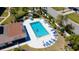 Overhead view of a sparkling community pool with inviting lounge chairs at 1770 Lake Pl # 1770D, Venice, FL 34293