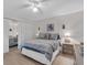 Cozy bedroom with light wood floors and a large closet at 204 46Th Avenue W Ter # 412, Bradenton, FL 34207
