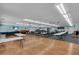 Large event space with hardwood floors, plenty of tables, and a sitting area at 204 46Th Avenue W Ter # 412, Bradenton, FL 34207