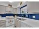 Kitchen with white countertops and stainless steel sink at 204 46Th Avenue W Ter # 412, Bradenton, FL 34207