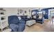 This spacious living room provides ample seating and a dining area for entertaining at 204 46Th Avenue W Ter # 412, Bradenton, FL 34207