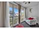Relax in the sunroom with views of the landscaped grounds from large, sliding glass doors at 204 46Th Avenue W Ter # 412, Bradenton, FL 34207