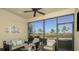 Cozy screened lanai with outdoor seating and views of the landscaped backyard at 23819 Collina Way # 203, Port Charlotte, FL 33980