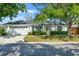 Charming single-story home with manicured lawn and a two-car garage at 2457 Appaloosa Cir, Sarasota, FL 34240