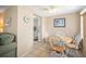 Cozy dining area with a round table, seating for four, tile floors, and natural light at 2620 White Sands Dr, Sarasota, FL 34231
