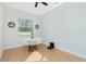 Small breakfast nook featuring tile flooring, window, and a cozy table setting at 2629 Rolling Rd, North Port, FL 34288