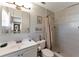 Well-maintained bathroom featuring a shower, a sink, and ample storage, offering a functional and clean space at 2916 Woodcrest Dr, Sarasota, FL 34239