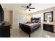 Cozy bedroom featuring a comfortable bed, neutral decor, and ample closet space, perfect for relaxation and rest at 2916 Woodcrest Dr, Sarasota, FL 34239