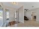 Inviting foyer featuring tiled floors, a decorative front door and a glimpse into the living spaces at 2916 Woodcrest Dr, Sarasota, FL 34239