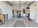 Spacious garage featuring ample storage space and an automatic door opener system at 2916 Woodcrest Dr, Sarasota, FL 34239