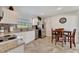 Efficient kitchen featuring white cabinetry, granite countertops, and stainless steel appliances at 2916 Woodcrest Dr, Sarasota, FL 34239