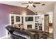 Charming living room showcasing a fireplace and built-in shelving at 323 Bobby Jones Rd # 323, Sarasota, FL 34232
