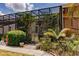 This landscaped patio area is fully screened and has a gate at 323 Bobby Jones Rd # 323, Sarasota, FL 34232