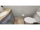 Clean and functional half-bathroom featuring a toilet and vanity at 3390 Ramblewood Ct, Sarasota, FL 34237