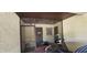 Entrance features a 'Welcome' sign on the brown door, a scooter, and a grated security door at 3390 Ramblewood Ct, Sarasota, FL 34237
