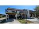 Condo community featuring covered parking and a landscaped exterior at 3390 Ramblewood Ct, Sarasota, FL 34237