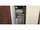 Laundry area with a white washer and dryer, storage cabinets and shelving at 3390 Ramblewood Ct, Sarasota, FL 34237