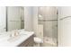 Bathroom featuring a modern vanity with a vessel sink and a glass-enclosed shower at 344 Maraviya Blvd, Nokomis, FL 34275