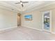 Bedroom with ceiling fan, recessed lighting, and access to a pool area through a glass door at 344 Maraviya Blvd, Nokomis, FL 34275