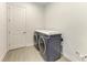Functional laundry room with modern washer and dryer, offering convenience and efficiency at 344 Maraviya Blvd, Nokomis, FL 34275