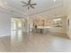 Expansive living area with tile floors, a gourmet kitchen, and an open layout perfect for entertaining at 344 Maraviya Blvd, Nokomis, FL 34275