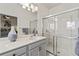 Bathroom vanity with glass enclosed shower at 3736 82Nd Avenue E Cir # 104, Sarasota, FL 34243