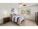 Bedroom featuring zebra art and windows at 3736 82Nd Avenue E Cir # 104, Sarasota, FL 34243