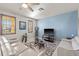 Comfortable living room with stylish decor, natural light, and ample seating space at 3736 82Nd Avenue E Cir # 104, Sarasota, FL 34243