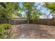 Fully fenced backyard perfect for outdoor activities and privacy at 3857 Woodrow Ridge St, Sarasota, FL 34233