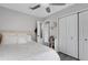 Bedroom featuring bright white closets and lots of natural light at 3857 Woodrow Ridge St, Sarasota, FL 34233