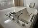 Close-up of walk-in bathtub with hydrotherapy jets and easy access features for comfortable bathing at 4538 Hamlets Grove Dr, Sarasota, FL 34235