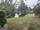 Picturesque pond with lush greenery at 4538 Hamlets Grove Dr, Sarasota, FL 34235