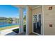 Exterior view of the condo complex and pond from the front entry of unit 319 at 4802 51St W St # 319, Bradenton, FL 34210