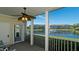 Relaxing screened-in patio with a view of the water fountain and community buildings at 4802 51St W St # 319, Bradenton, FL 34210