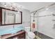 Modern bathroom featuring a glass shower and unique glass sink at 5042 Marsh Field Rd # 16, Sarasota, FL 34235