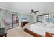 Comfortable bedroom with sliding door access to the outdoor porch area at 5042 Marsh Field Rd # 16, Sarasota, FL 34235