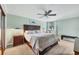 Inviting bedroom featuring a ceiling fan and a cozy window bench at 5042 Marsh Field Rd # 16, Sarasota, FL 34235