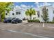 A well-maintained building featuring convenient guest parking and beautifully manicured landscaping at 5042 Marsh Field Rd # 16, Sarasota, FL 34235