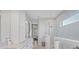 Bright bathroom with a glass shower, dual vanity with quartz countertops, and neutral color palette at 5203 Title Row Dr, Bradenton, FL 34210