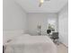 Bedroom featuring a ceiling fan, window with blinds, closet, desk and chair at 5203 Title Row Dr, Bradenton, FL 34210
