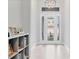 Bright entryway with tiled floors and modern shelving at 5203 Title Row Dr, Bradenton, FL 34210