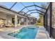 Pool with screened-in enclosure at 5203 Title Row Dr, Bradenton, FL 34210